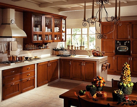 rustic kitchen with rich colours, earthy textures and natural finishes like granite, and copper to bring balance