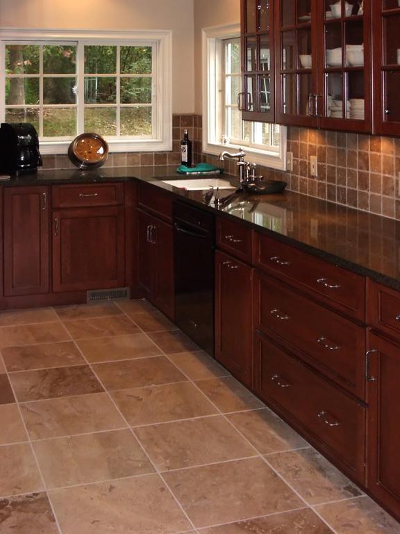 rustic kitchen with rich colours, earthy textures and natural finishes like granite, and copper to bring balance