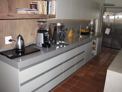 modern kitchen with terracotta tiles